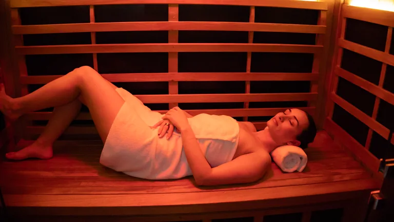 A member resting in the infrared sauna at FORM50 Boca Raton